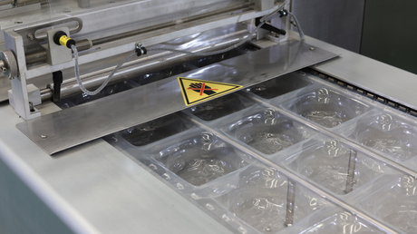 Fabricantes completos de la máquina de envasado de salto de vacío automático de alimentos para la venta HVR-520A